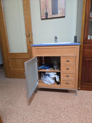 Mueble de baño con lavabo y cajones