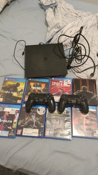 Consola PS4 Slim 1TB + 7 Juegos + 2 Mandos
