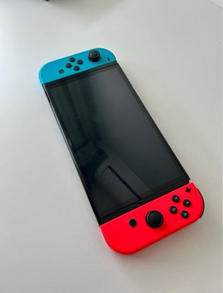 IMPECABLE Nintendo Switch OLED + Funda Protectora