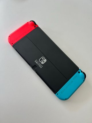 IMPECABLE Nintendo Switch OLED + Funda Protectora