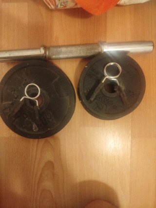 Barras y discos musculación