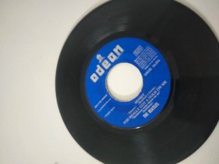 Vinilo y postal The Beatles