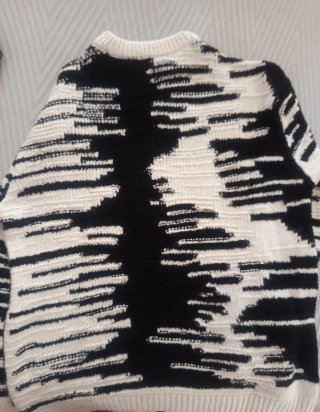 Jersey de punto blanco y negro