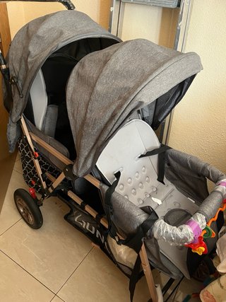 Carrito doble para bebé gris