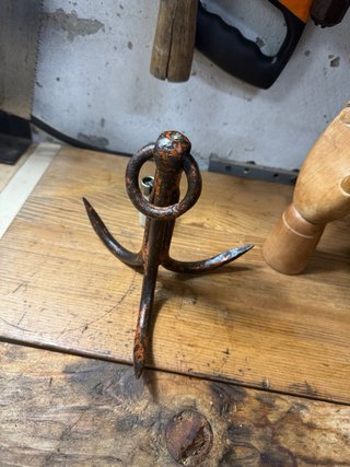 Gancho antiguo de pozo