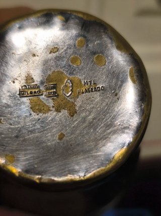 Vaso antiguo bañado en plata