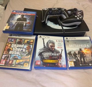 Consola PS5 Slim 1TB Negra + 2 Mandos + 4 juegos