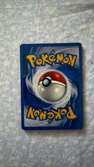 Carta Pokémon Charizard EX Dorada