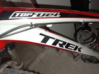 Bicicleta de Montaña Trek top fuel Roja y Blanca
