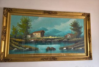 Quadro con cornice dorata