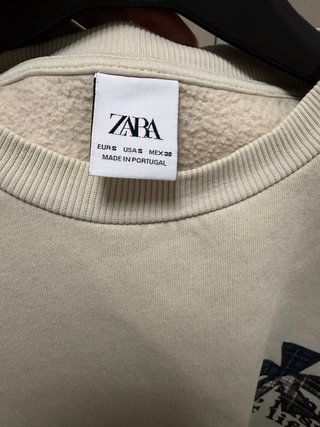 Sudadera beige con estampado