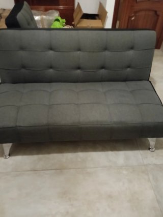 Sofá cama gris tela y metal