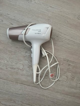Secador de pelo Rowenta Oro y Blanco