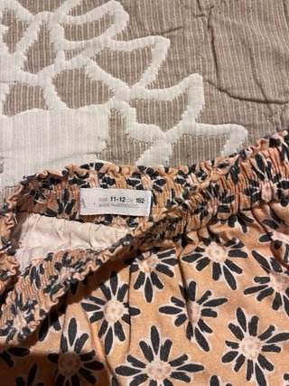 Falda Zara flores naranja y negra de niña talla 12