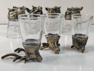 12 chupitos de cristal con base en metal animales
