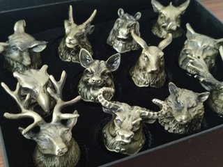 12 chupitos de cristal con base en metal animales