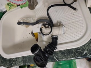 Desagüe Lavadora AEG: Filtro y Gomas