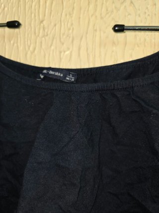 Top crop Bershka volante y encaje