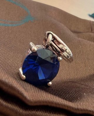 Colgante azul con baño de plata
