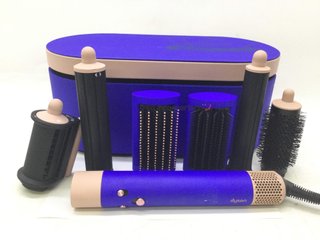secador pelo dyson hs05