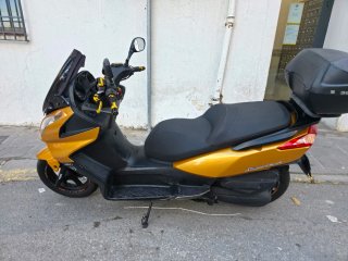 Cambio Kymco Superdink 125 por coche.