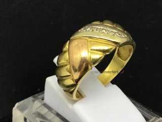 anillo oro 18k con piedra con diamante