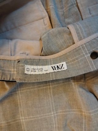 Pantalón de tela a cuadros Zara