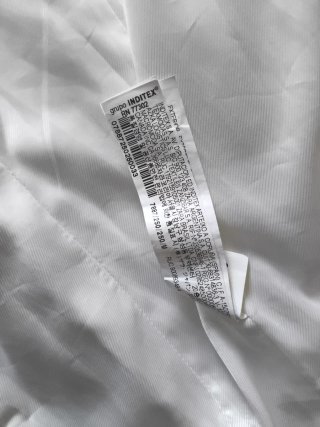 Vestido tipo americana sin manga Zara blanco