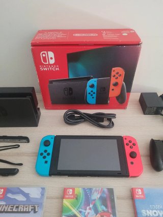 Nintendo Switch como NUEVA + Juegos y Accesorios