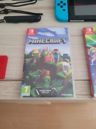Nintendo Switch como NUEVA + Juegos y Accesorios