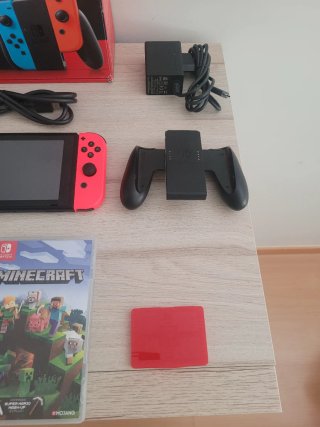 Nintendo Switch como NUEVA + Juegos y Accesorios