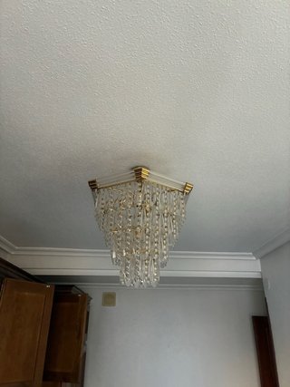Lámpara de cristal de roca dorada