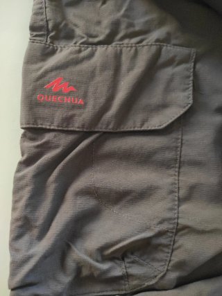 Pantalón trekking convertible Quechua T.12-13