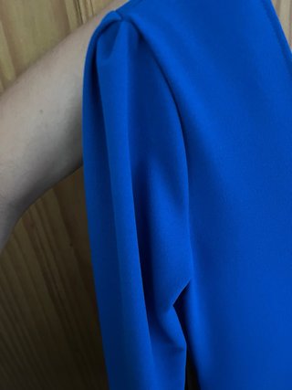 Traje de flamenca azul con volantes