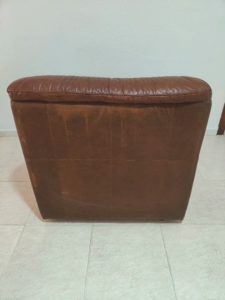 Sillón de piel marrón muy cómodo