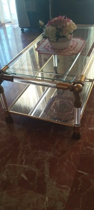 Mesa de centro cristal y metal dorada