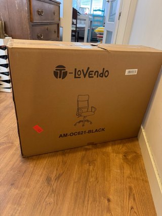 Silla de oficina ergonómica en su caja