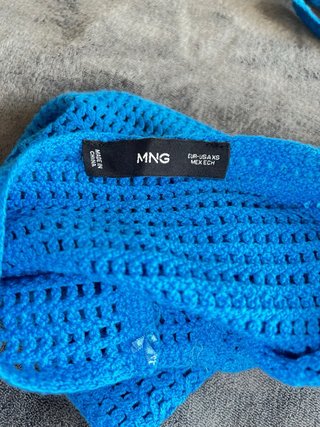 Top azul crochet blanco y pantalón Pull&Bear