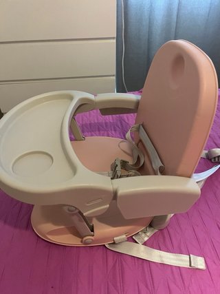 Trona de viaje para bebé rosa