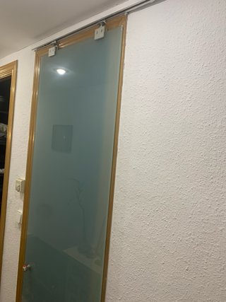 Puerta corredera de cristal