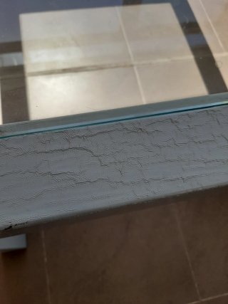Mesa de centro de cristal y metal