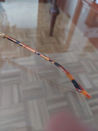 Gafas de sol Ray-Ban doradas y marrones