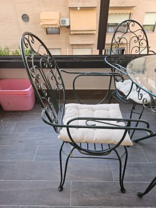 Mesa de jardín con 6 sillas de metal