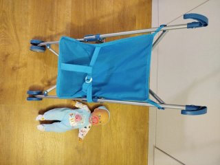 Carrito de juguete  con muñeco