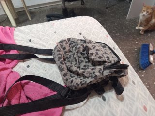 Mochila leopardo gris y rosa