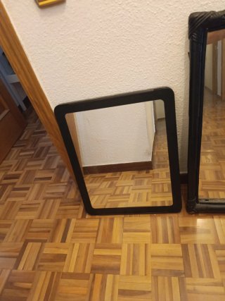 Espejo negro moderno