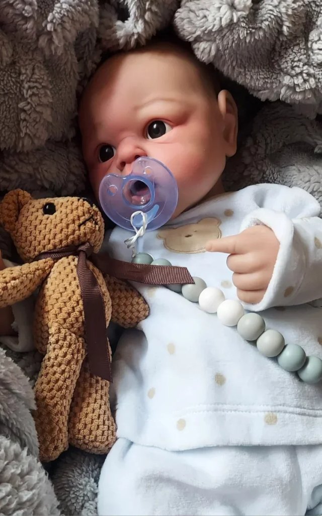 Reborn niño silicona platino 47cm piel blanquita