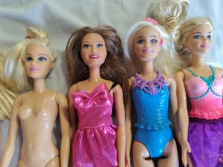 Lotto di 7 Barbie