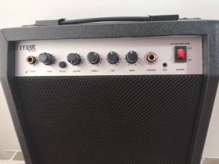 Bajo Eléctrico Sunburst con amplificador