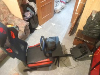 Asiento de simulador con volante